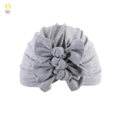 China Pure Newborn Indian Babi Picture Indian Hijab Soft Hat Toddler Headwrap Baby Ear Turban Fashion Picture Cotton Bow Top Knot Solid Fat Hat for sale