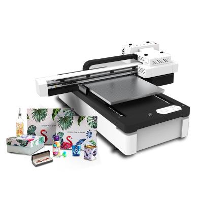 China A1/A2/A3/A4 Hotels Small Size UV ​​Flatbed Printer 6090 UV Printer for sale