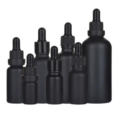 China Hot Sale 5ml 10ml 15ml 20ml 30ml 50ml 100ml Matte Frosted Black Glass Personal Care Dropper Essential Oil Bottles for sale