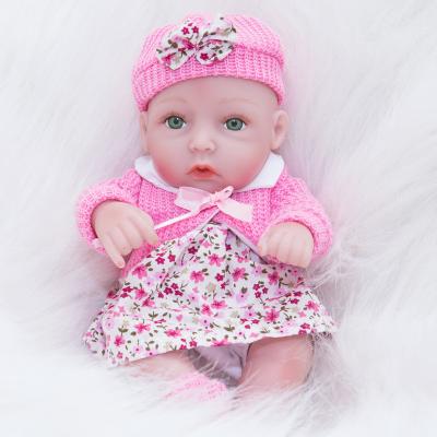 China Free Shipping Mini Lifelike Small Npk Baby Silicone Vinyl Material 30cm Newborn Dolls With Clothes for sale