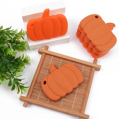 China Soft Toy Wholesale Orange Silicone Halloween Pumpkin Beads Baby Teether Toy for sale