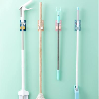 China Household Wall Hanger Tool free punching mop rack mop hook toilet rack powerful traceless Te koop