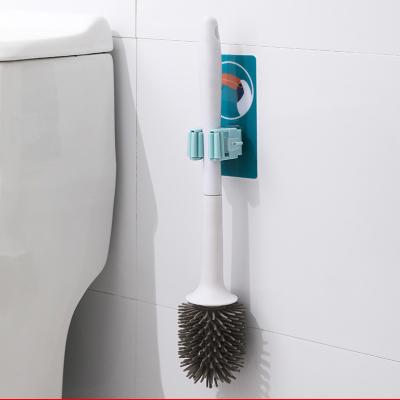 China Self Adhesive Wall Hanger Tool Mop Broom Holder Mop Storage Organizer Rack for Bathroom à venda