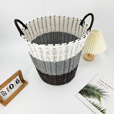 China Household Woven Rattan Laundry Basket Simple Coat Basket Dirty Clothes Basket Plastic Basket Toy Storage Bucket for sale