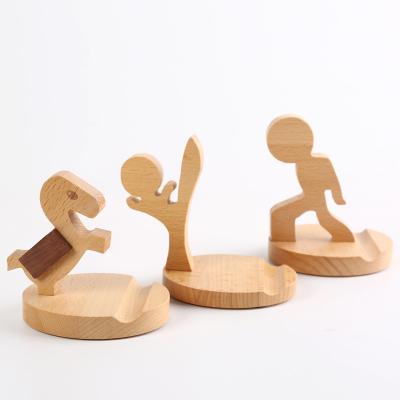 China Wholesale New Design Eco-Friendly Beech Wood Mobile Phone Stand For Home Office for sale