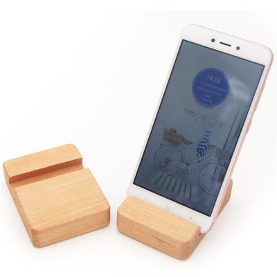 China Flexible Customized Logo Self Use Beech Wood Phone Holder Hot Sale Phone Accessories for sale