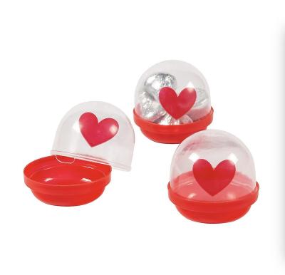 China Funny Educational Toy 2 Inch Valentine Day Capsules with Colored Lids Small Containers for Mini Toys Gifts and Trinket Goodie Bag Fillers for Children for sale