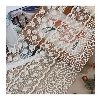 China Viable beige lace DIY accessories embroidery bow milk silk lace fabric skirt decoration lace accessories for sale