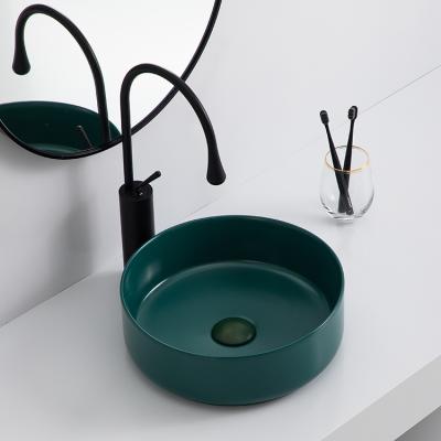 China Wholesale Modern Matte Green Bathroom Sink Countertop Drak Round Shape Ceramic Art Wash Basin for sale