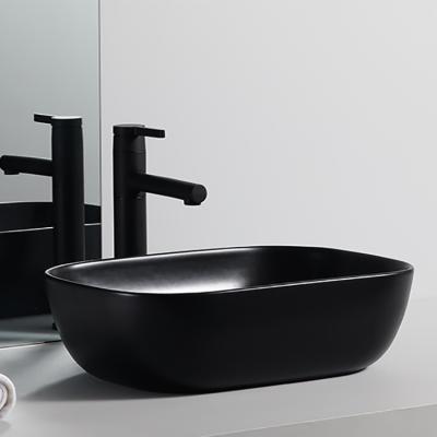 China Wholesale Modern Design Table Top Art Basin Black Ceramic Bathroom High Quality Sink For Hotel for sale