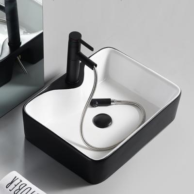 China New Arrival Modern Simple Design Bathroom Wash Hand Art Ceramic Small Size Basin for sale