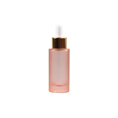 China Personal Care 30ml Shoulder Flat Pink Rose Gold Gel Round Cylinder Glass Oil Dropper Bottle For Essential Oil for sale