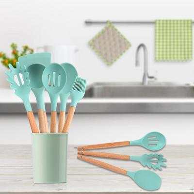 China Sustainable Sustainable Kitchenware Spatula 9 Pieces Set Wooden Handle Silicone Kitchenware Set for sale