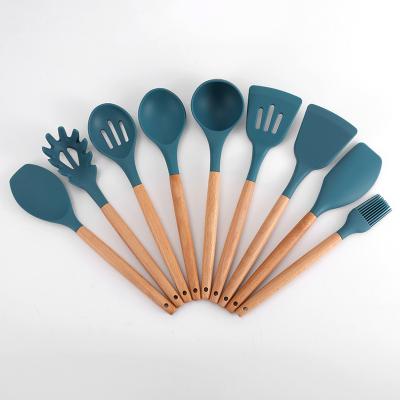 China Sustainable Silicone Wood Cookware 9 Piece Kitchen Cooking And Baking Utensil Set With Wood Handle for sale