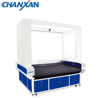 China Double Laser Cutter Head Laser Cutting Machine Textile Laser Cutting CCD CO2 Laser Cutter Engraving Machine for sale