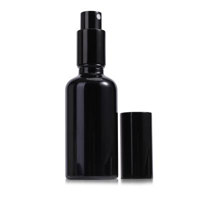 China 5ml 10ml 20ml 30ml Lotion Spray Round Empty Black Glass Essential Oil Bottles Cosmetic Packaging Boxes for sale