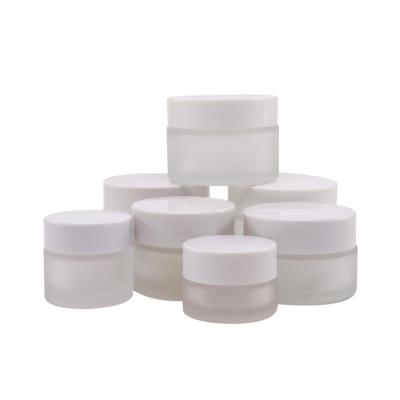 China Cosmetic Packaging 15g 30g 50g Matte Frosted Clear Glass Cream Jar With White Lid for sale