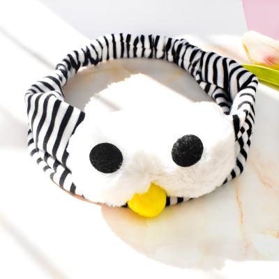 China Eco-Friendly Funny Plush Large Three-Dimensional Ball Solid Color Stripe Eye Hair Band Make Up Face Hair Wash Headband For Women Custom for sale