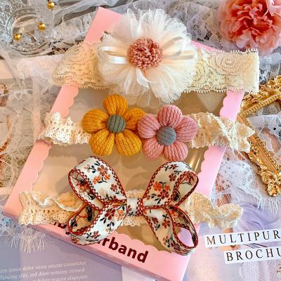 China New Bowknot Flower Headband 3Pcs/Box Eco-Friendly Korean Soft Lace Flower Elastic Girls Flower Headband And Pearl Headband Costume for sale