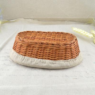 China Sustainable Custom Rattan Bread Basket Oval With Linen Covering for sale