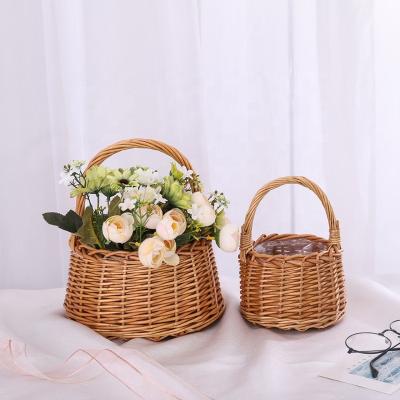 China Sustainable Custom Small Wicker Desktop Storage Basket With Handle For Flowers Plant for sale