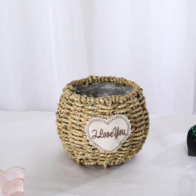 China Multifunctional Sea Grass Straw Grass Small Hand Woven Basket Without Handle for sale