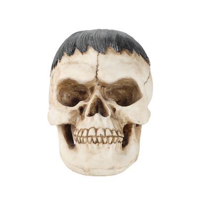 China Other Resin Grinning Human Skull Statue Highly Realistic Light Weight Sturdy Handcrafted Reproduction Home Decor for sale