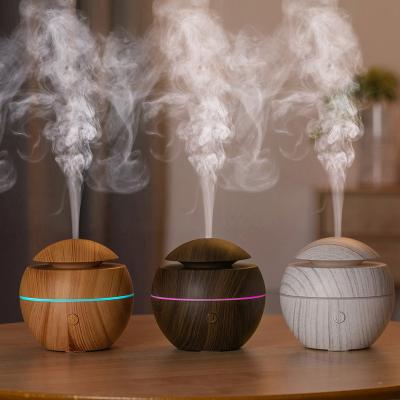 China OEM fashional outdoor support design wood grain aromatherapy machine in magic led lightweight portable usb humidiffe with CE ROHS FCCr for sale