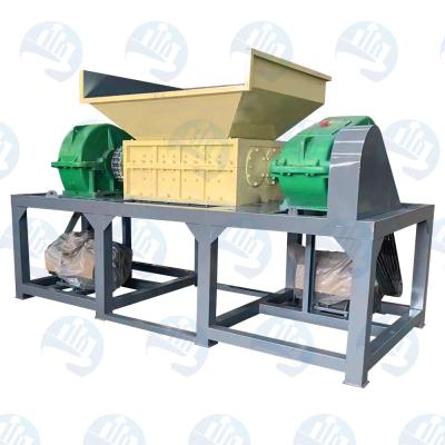 China Scrap Car Engine Recycling OTR Tire Shredder Equipment Used Rubber Tire Shredding Recycling Tools Double Shaft Waste Tire Shredder for sale