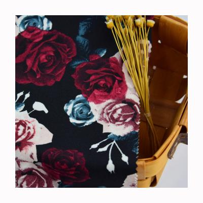 China 180 gsm workmanship sustainable professional poly spandex crepe scuba spandex floral printed fabric for evening dresses for sale