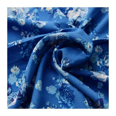 China Stain Resistant AMAZON IS HOT SELLING IN 2021 100 CHALLIE SLIM BLUE FLOWER PRINTED WOVEN FABRIC FOR SUMMER DRESS for sale