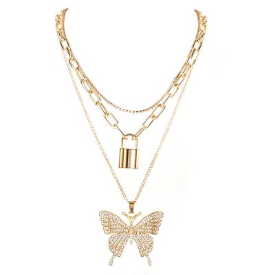 China Retro Vintage Gold Lock Diamond Rhinestone Large Butterfly Pendant Exaggerated Multilayer Geometric Necklace Set Jewelry For Women for sale