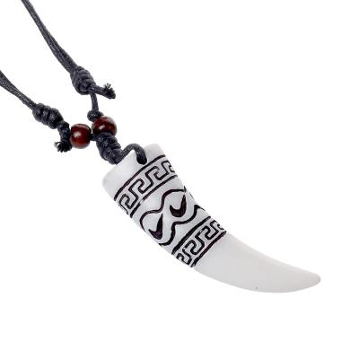 China Trendy Cow Horn Pendant Necklace with Black Cotton Rope Men's Long Necklace for sale