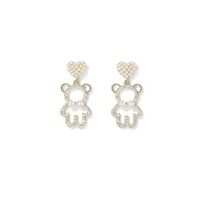 China Environmental friendly hollow pearl diamond-studded small and supple exquisite fashion sweet and cute bear high-end earrings for sale