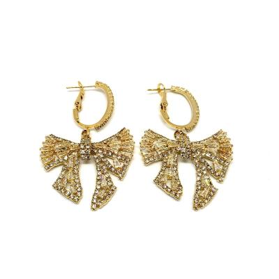 China Fashionable knot temperament bow temperament soft and light luxury INS full diamond wind fairy smart earrings for sale