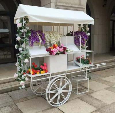 China Hot Elegant Wedding White Dessert Parties Wholesale Decoration Display Stand Metal Sweet Trolley for sale