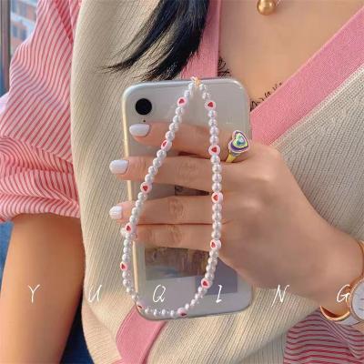 China New Fashion Original Elegant Pearl Heart Pearl Phone Chain Red Strap Lanyard Phone Accessories Chain for sale