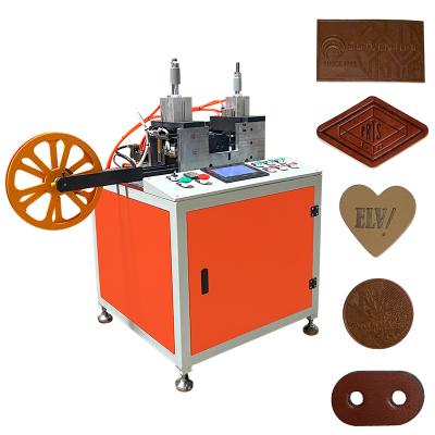 China Garment Shops Label Embossing Leather Labeling Machine for sale