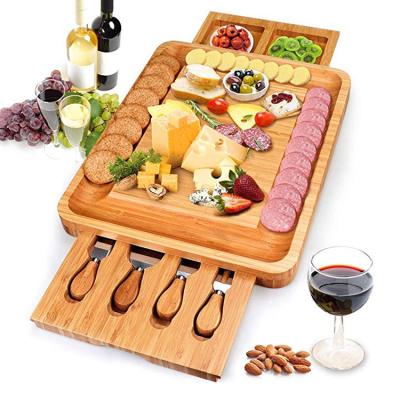 China Beautiful and practical sustainable cheese board and bamboo knife set for sale