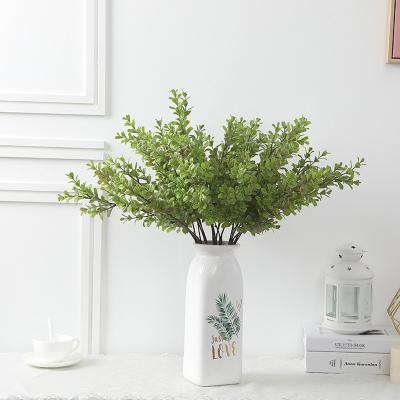 China 2022 New Trend Home Wholesale High Quality Artificial Boxwood Decotation Single Wedding Branch For Home Decoration Outdoor Wedding for sale