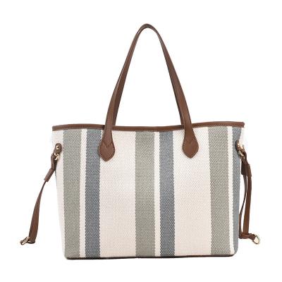 China Fashion Canvas Mother Bag 2022 New High Capacity One Shoulder Underarm Bag Popular Canvas Stripe Tote Bag for sale