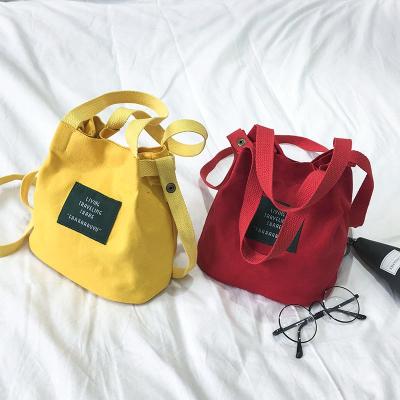 China Women's Handbags Ladies Ladies Bags Travel Canvas Mini Messenger Shoulder Bag Portable Cute Handbag Bucket Bag for sale