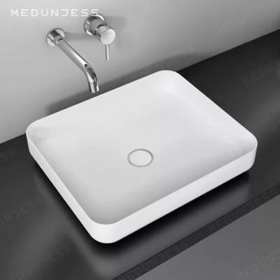 China Easy Clean Rectangular White Wash Basin Countertops Sink Bathroom Sinks Wash Basin Solid Outdoor Resin Basin Stone Lavatorios for sale