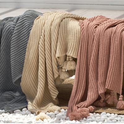 China High Quality YIRUIO Anti-Static Stock Lot Soft Knitted Acrylic Blanket With Tassel for sale