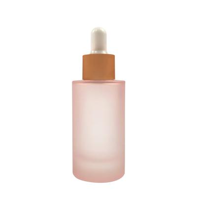 China Cosmetic Frosting Glass Dropper Bottles Customized Cosmetic Lotion Glass Bottle Packaging for sale