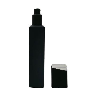 China Factory Supply 20g 50g 35ml 100ml 120ml Wholesale Black Cosmetic Glass Bottle Lotion Pump Bottles for sale