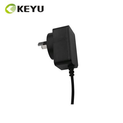 China RoHS& SCOPE Power Adapter Output 5V 2A 12V 1A AC DC Adapter For Security Camera for sale