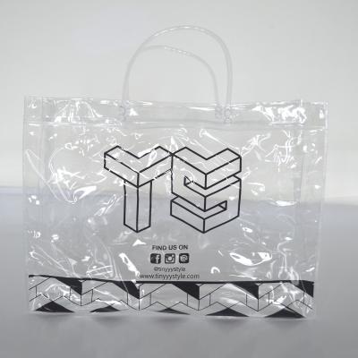 China High Quality Heat Sealed Drinking Waterproof Transparent Handled Packing PVC Packing Bag for sale