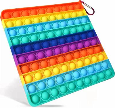 China Wiggle Toy For Autism Large Pop Wiggle Toy Rainbow Square Pop Push Wiggle Toy Silicone Noise Sensory Stress Reliever Toy for sale