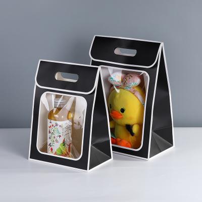 China Recycled Materials Spill Open Window Packaging Gift Bag Paper Bag Transparent Holiday Packaging Bag for sale